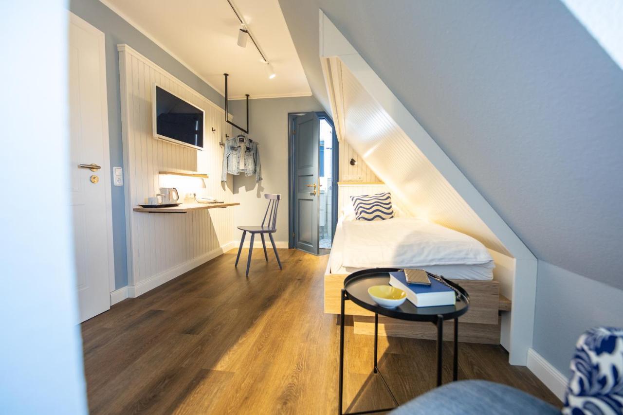 Hotel Ual Oeoemrang Wiartshues Norddorf Esterno foto